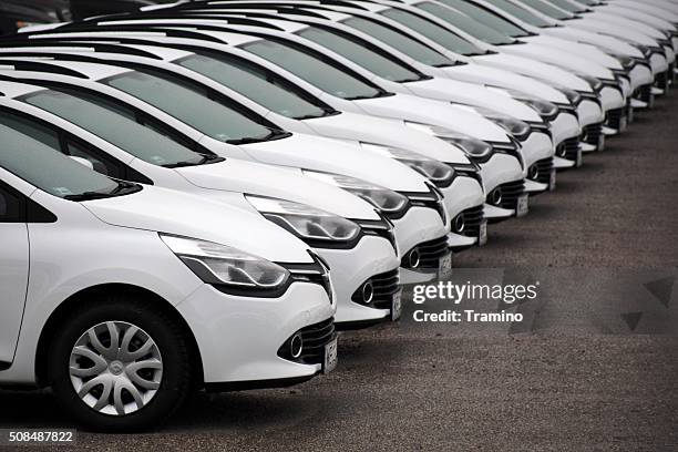 renault cars in a row - renault nissan stock pictures, royalty-free photos & images