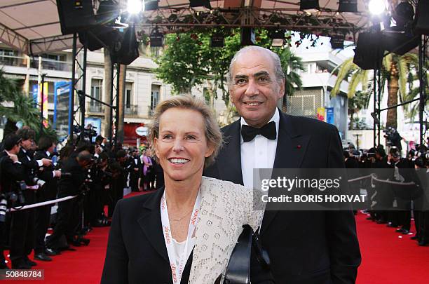 French journalists Christine Ockrent and Pierre Benichou arrive for the official projection of the film "The Edukators", 17 May 2004, at the 57th...