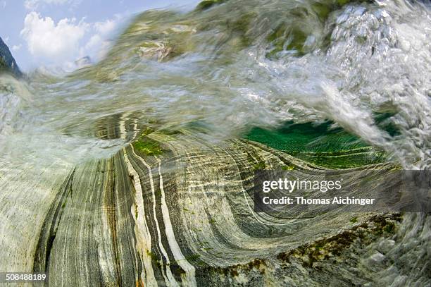 inside a waterfall in the verzasca river, lavertezzo, valle verzasca, canton ticino, switzerland - kanton tessin stock pictures, royalty-free photos & images