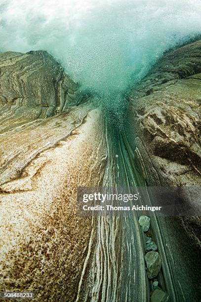 underwater view of a waterfall in the verzasca river, lavertezzo, valle verzasca, canton ticino, switzerland - kanton tessin stock pictures, royalty-free photos & images