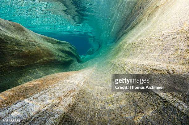 erosion of the riverbed of the verzasca river, lavertezzo, valle verzasca, canton ticino, switzerland - kanton tessin stock pictures, royalty-free photos & images