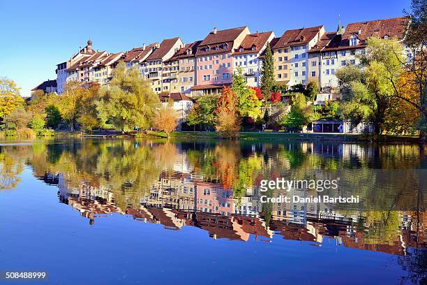 historic centre of wil with reflection in pond of municipal park, canton of st. gallen, switzerland - st gallen stock pictures, royalty-free photos & images