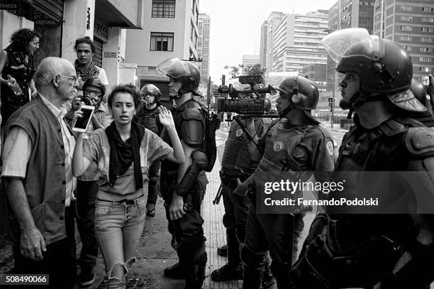 demonstrators and police - surrendering stock pictures, royalty-free photos & images