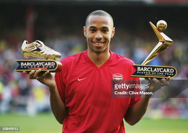 Thierry Henry of Arsenal shows off his Golden Boot and Barclaycard Premiership Player of the Year Award during the Martin Keown Testimonial match...