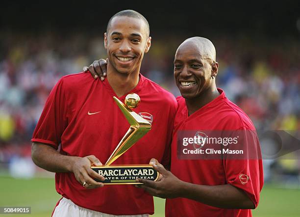 Thierry Henry of Arsenal is presented with his Barclaycard Premiership Player of the Year Award by Ian Wright during the Martin Keown Testimonial...