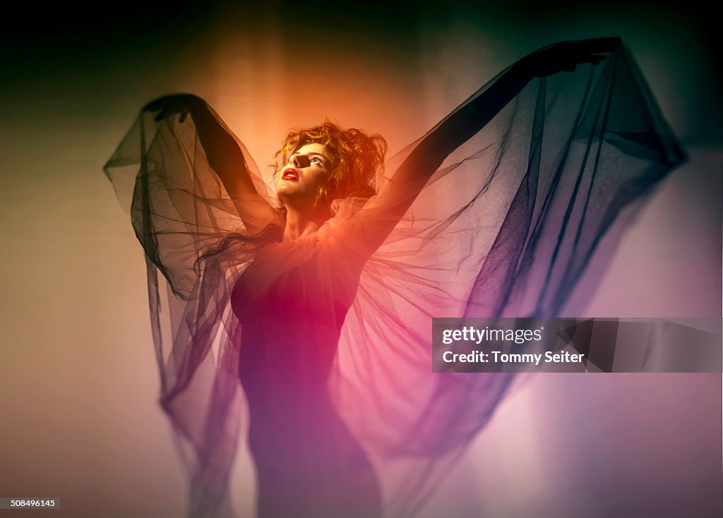 Young woman with wing veil