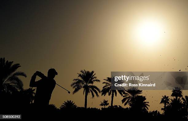 Gary Stal of France plays his second shot on the par five 10th hole during the second round of the Omega Dubai Desert Classic on the Majlis course at...