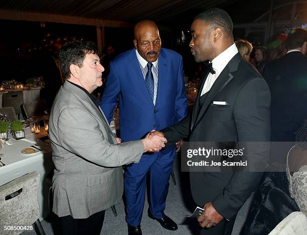 Eddie Debartolo Jr., former Cleveland Browns running back and NFL Hall of Famer Jim Brown, and former Jets player Curtis Martin attend Haute Living...