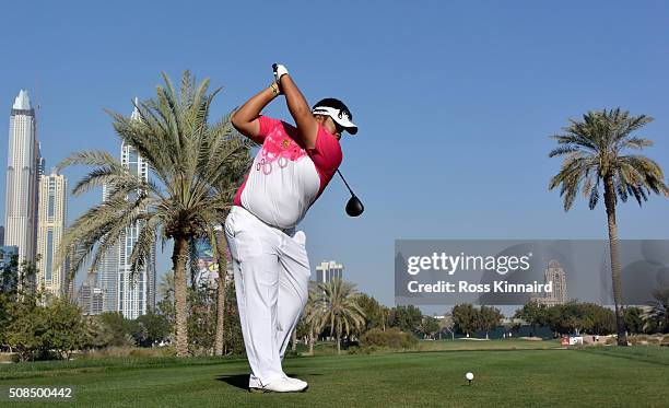 Kiradech Aphibarnrat of Thailand hits his tee shot on the par four 16th hole during the second round of the Omega Dubai Desert Classic on the Majlis...