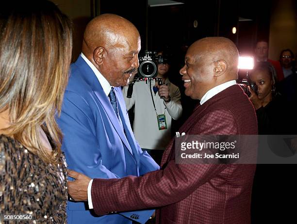 Former Cleveland Browns running back and NFL Hall of Famer Jim Brown and former San Francisco mayor Willie Brown attend Haute Living And Louis XIII...