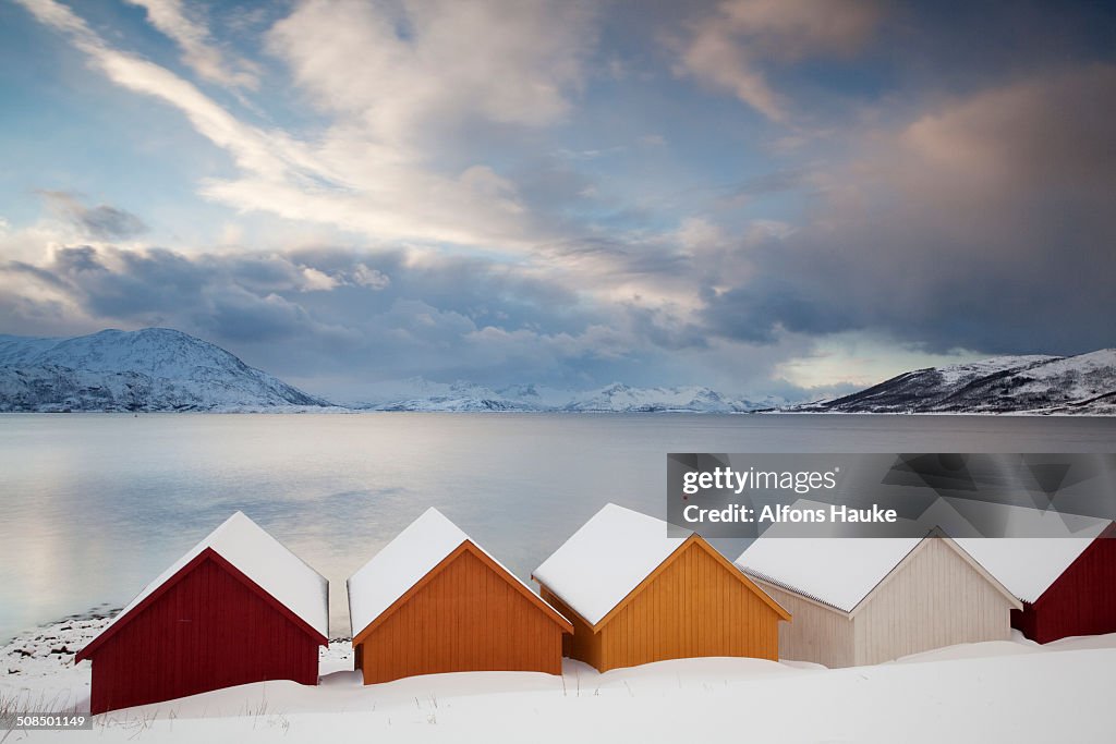 Wooden huts on the Nordfjord, Tromso or Tromso, Norway, Europe