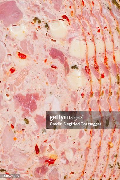 slices of leberkaese, liver cheese, meat loaf with cheese, peppers and fresh herbs, german and austrian cuisine - leberkäse stock pictures, royalty-free photos & images