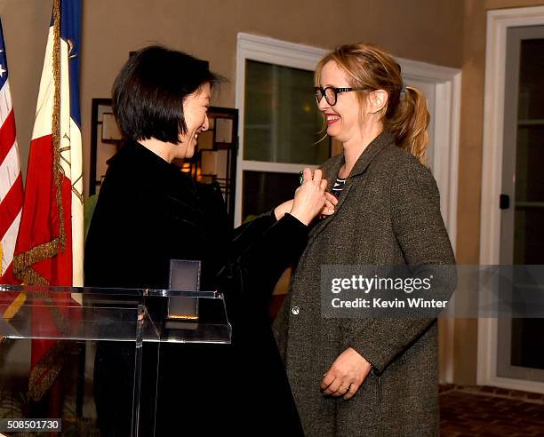 Actress Julie Delpy receives the French Order of Arts and Letters award from Mme Fleur Pellerin, French Minister of Culture and Communications at a...