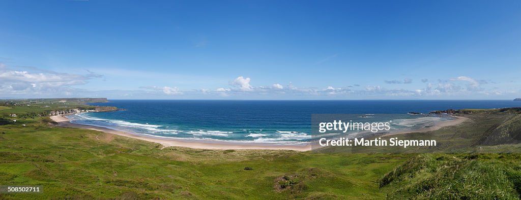 White Park Bay or Whitepark Bay with Portbradden, left, Antrim Coast, County Antrim, Northern Ireland, United Kingdom, Europe