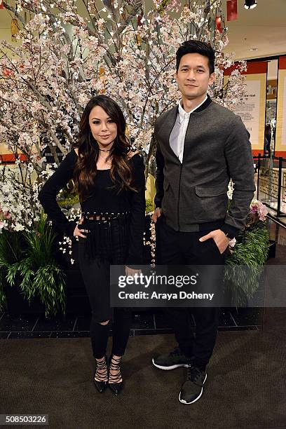 Janel Parrish and Harry Shum Jr. Attend the 2016 Lunar New Year Celebration at The Beverly Center on February 4, 2016 in Los Angeles, California.