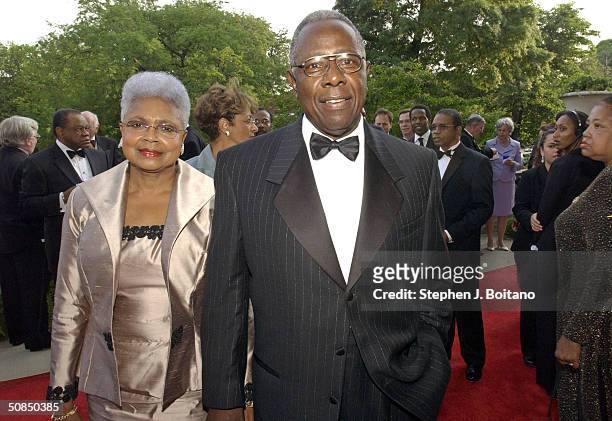 Baseball Hall of Fame member Hank Aaron and wife Billye Aaron attend the Brown v. Board of Education 50th Anniversary Gala on May 17, 2004 in...