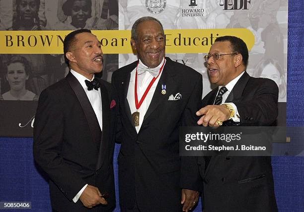 President of the NAACP Kweisi Mfume, Bill Cosby and Howard Unversity President H. Patrick Swygert attend the Brown v. Board of Education 50th...