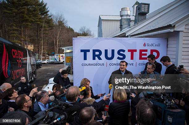 Republican presidential candidate, Sen. Ted Cruz, R-Texas, talks to the press before speaking to potential supporters at a meet and greet event at...