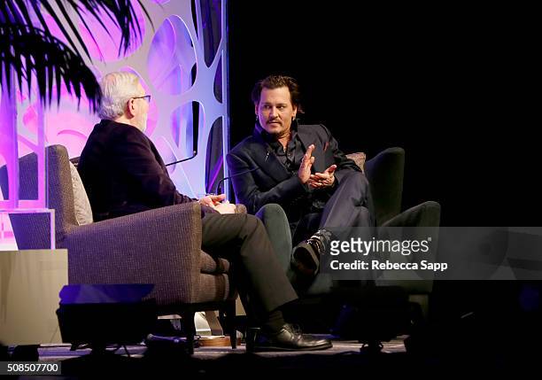 Film Critic Leonard Maltin and ActorJohnny Depp speak onstage at the Maltin Modern Master award tribute during the 31st Santa Barbara International...