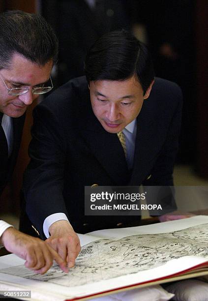 Japanese Crown Prince Naruhito visits a exhibition about Portuguese-Japanese relations at the Arquivo Nacional da Torre do Tombo in Lisbon, 18 May...