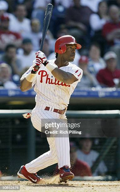 Shortstop Jimmy Rollins of the Philadelphia Phillies at bat during the game against the St. Louis Cardinals at Citizens Bank Park on May 6, 2004 in...