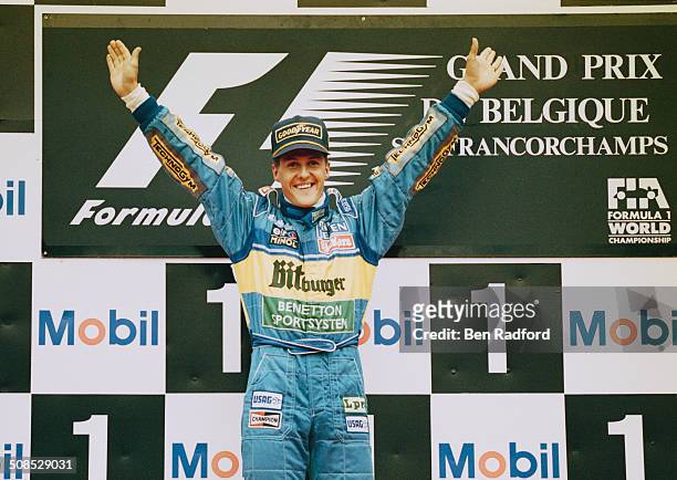 Michael Schumacher of Germany, driver of the Mild Seven Benetton Renault Benetton B195 Renault RS7 V10 celebrates winning the Belgian Grand Prix on...