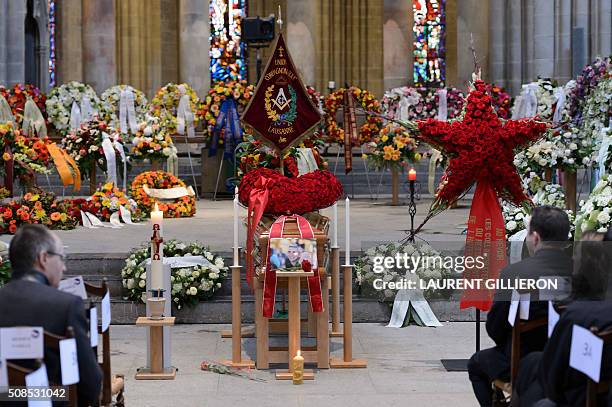 People pay tribute to Swiss French chef Benoit Violier during his funeral ceremony at the Cathedral of Lausanne, western Switzerland, on February 5,...