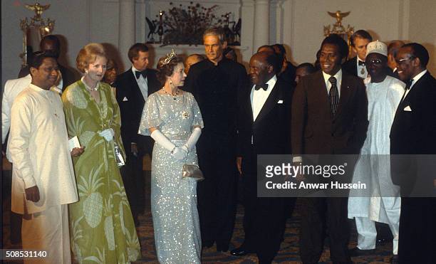 Queen Elizabeth II and Prime Minister Margaret Thatcher attend a ball to celebrate the Commonwealth Heads of Government Conference on October 01,...