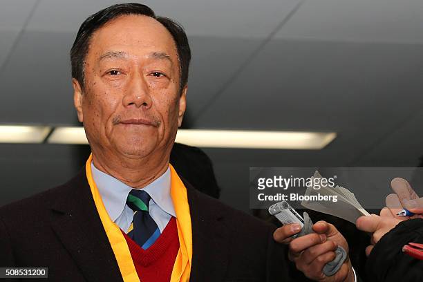Terry Gou, chairman of Foxconn Technology Group, pauses as he speaks to media at the Sharp Corp. Headquarters in Osaka, Japan on Friday, Feb. 5,...