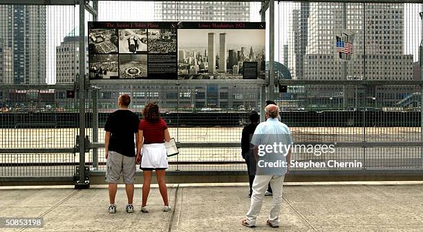 visitors continue to visit ground zero as 9/11 commission sits in new york - ground zero stock pictures, royalty-free photos & images