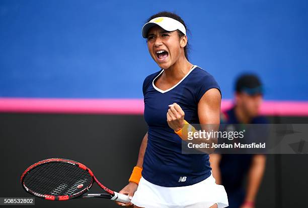 Heather Watson of Great Britain celebrates a point in her match against Sofia Shapatava of Georgia during the tie between Georgia and Great Britain...