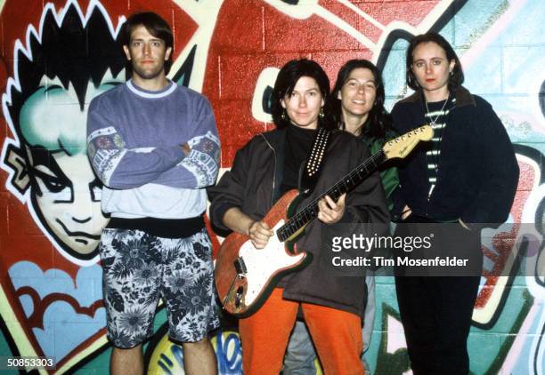Portrait of British-American rock group the Breeders as they pose in front of a painted wall prior to their performance at the Catalyst nightclub,...