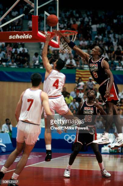 Drazen Petrovic of Croatia lays the ball up over Scottie Pippen of the United States during the 1992 Olympic game on July 27, 1992 in Barcelona,...
