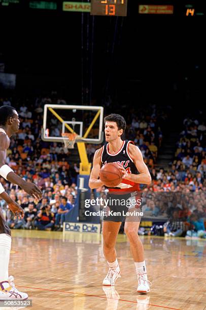 Drazen Petrovic of the Portland Trail Blazers passes the ball during the game against the Los Angeles Lakers during a 1989-90 season game at the...