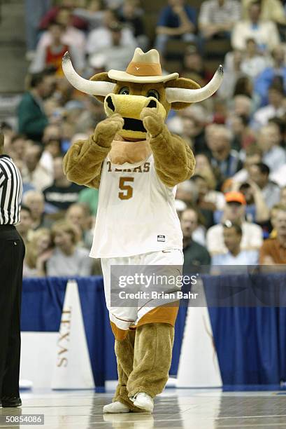 The Texas Longhorns mascot entertains the crowd during a first round game in the NCAA Men's Basketball Tournament against the Princeton Tigers at...