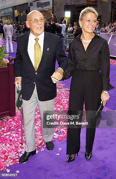 Sir Stirling Moss and his wife Susie attend the relaunch of Asprey's flagship London store at its New Bond Street location on May 18, 2004 in London....