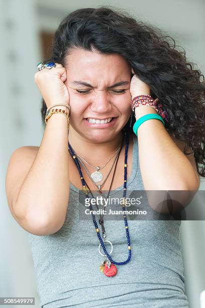 young frustrated  curly haired woman - tantrum stock pictures, royalty-free photos & images