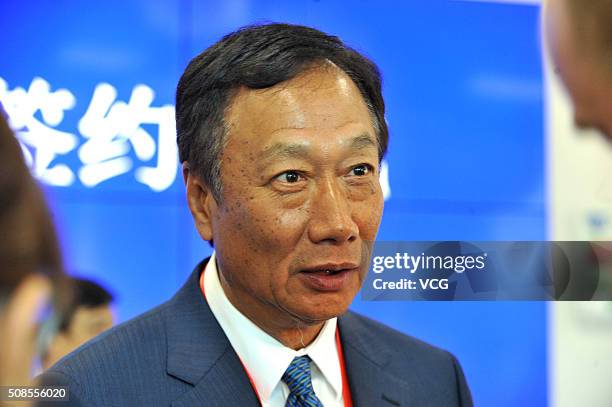 Of Foxconn Guo Taiming speaks at a press conference on July 10, 2014 in Guiyang, Guizhou province of China. CEO of Foxconn Guo Taiming arrived at...