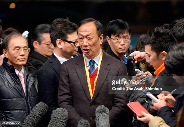 Taiwan's Hon Hai Precision Industry Co, trading as Foxconn Technology Group chairman Terry Gou speaks to media reporters after his meeting with borad...