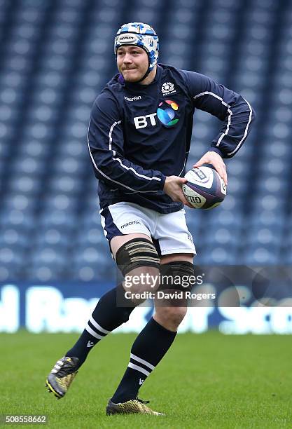 David Denton runs with the ball during the Scotland captain's run at Murrayfield Stadium on February 5, 2016 in Edinburgh, Scotland.