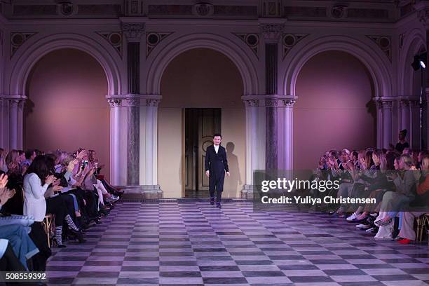 Mark Kenly Domino Tan appears at the end of his show during the Copenhagen Fashion Week Autumn/Winter 2016 on February 4, 2016 in Copenhagen, Denmark.