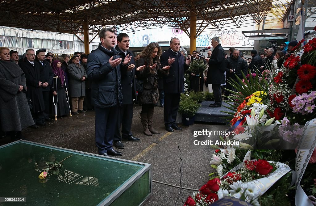 Markale Representatives of the Non-governmental organizations pray during the ...