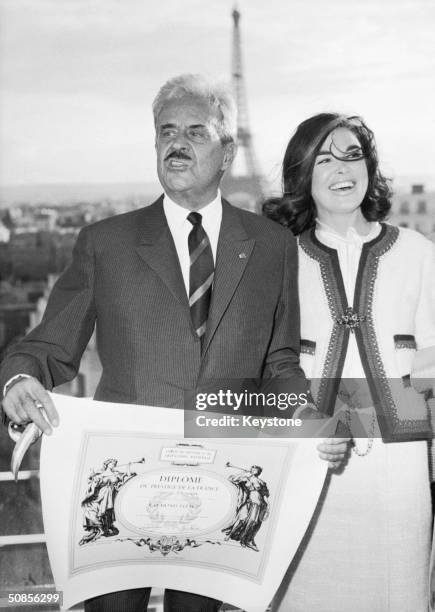 American industrial designer Raymond Loewy receives a Prestige de la France diploma at a ceremony in Paris, 18th September 1964. He is accompanied by...