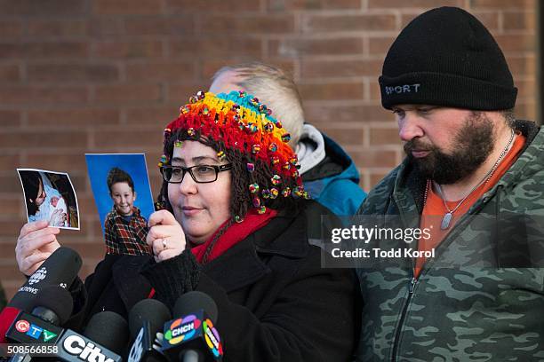 Jennifer Neville-Lake shows photos of two of her children with her husband Edward Lake after Marco Muzzo, who killed their children while driving...