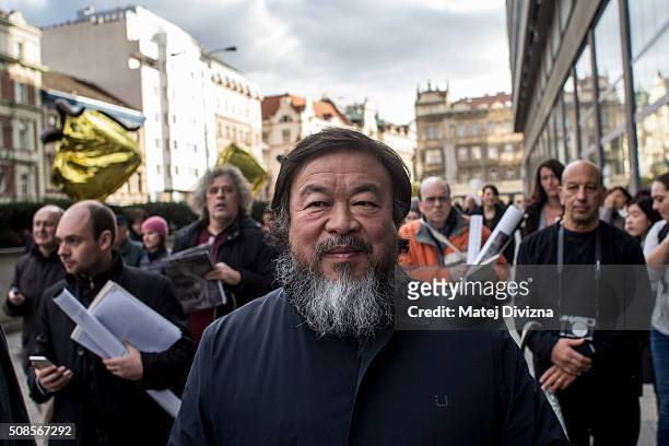 Chinese artist Ai Weiwei attends a gathering with media in front of the Trade Fair Palace run by the National Gallery on February 5, 2016 in Prague,...