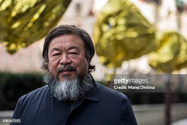 Chinese artist Ai Weiwei attends a gathering with media in front of the Trade Fair Palace run by the National Gallery on February 5, 2016 in Prague,...