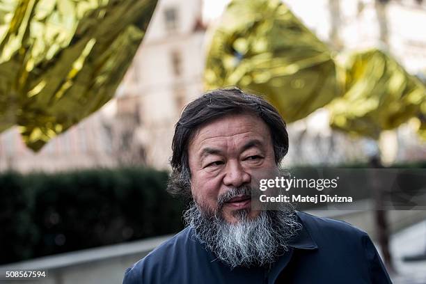 Chinese artist Ai Weiwei attends a gathering with media in front of the Trade Fair Palace run by the National Gallery on February 5, 2016 in Prague,...