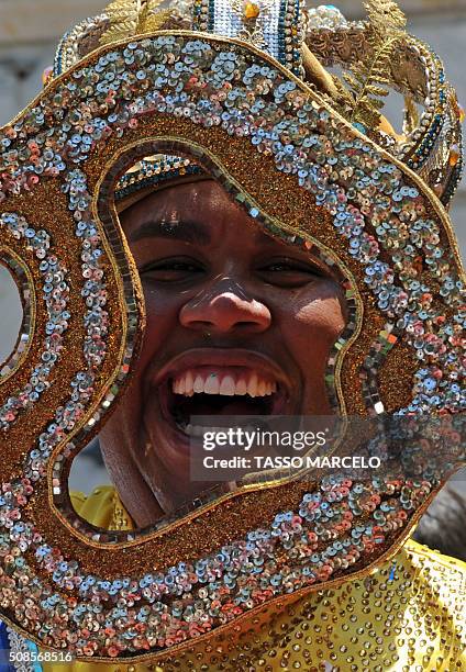 Carnival King Momo, Wilson Dias da Costa Neto laughs while he receives the keys to the city from during the official launching of the 2016 Carnival...