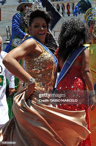 Dancer performs while Carnival King Momo, Wilson Dias da Costa Neto receives the keys to the city during the official launching of the 2016 Carnival...