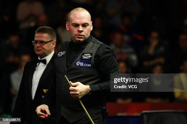 Stuart Bingham of England reacts during the second round match against Ryan Day of Wales on day three of German Masters 2016 at Tempodrom on February...